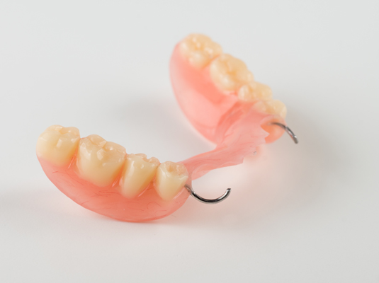 When Does a Dentist Use Partial Dentures to Replace Missing Teeth?
